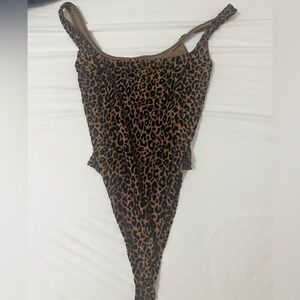 Naked wardobe leopard nude body suit